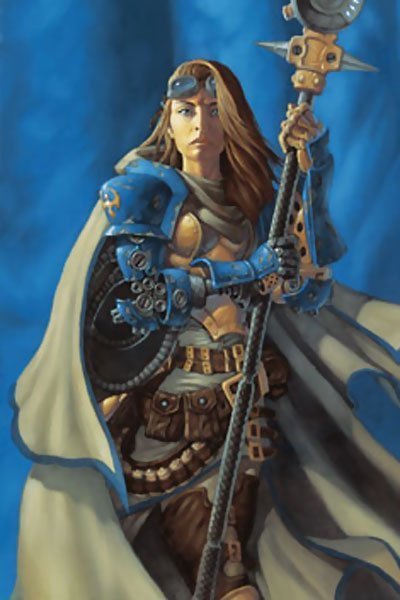 A woman with long blond hair wearing blue armor stands