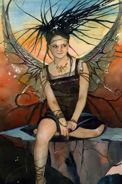 a dark haired fairy in a black dress sits and smiles with wings outstretched.