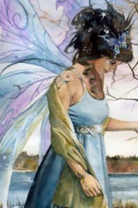 A dark-haired fairy in a gauzy dress in a reflective mood.