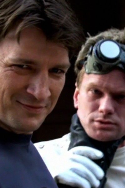 Nathan Fillion as Captain Hammer and Neil Patrick Harris as Dr. Horrible