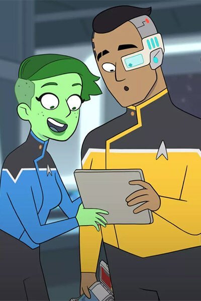 Two Starfleet ensigns reading a PADD.