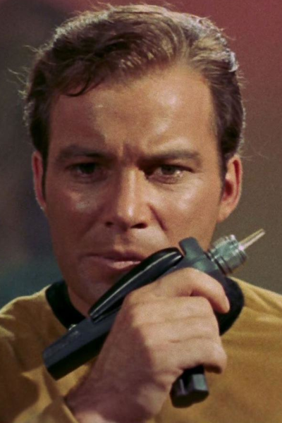 Captain Kirk holding a phaser, as designed by Wah Chang.