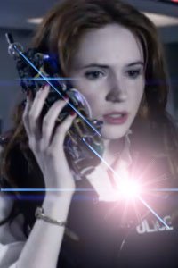 Poor Amy Pond being attacked by lens flares on the shiny bridge of a doomed starliner.