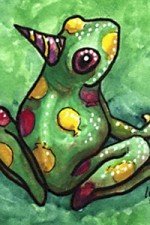 A green tree frog with bright red and yellow spots sporting a party hat.