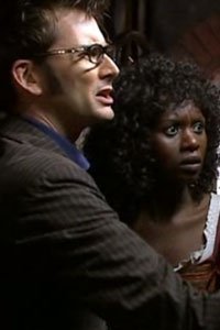 David Tennant as the Doctor, and Velile Tshabalala as Rosita in the Doctor Who Christmas episode 